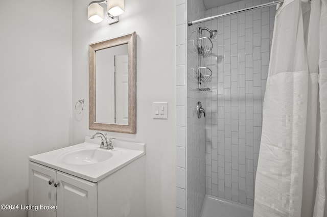 bathroom with vanity and a shower with shower curtain