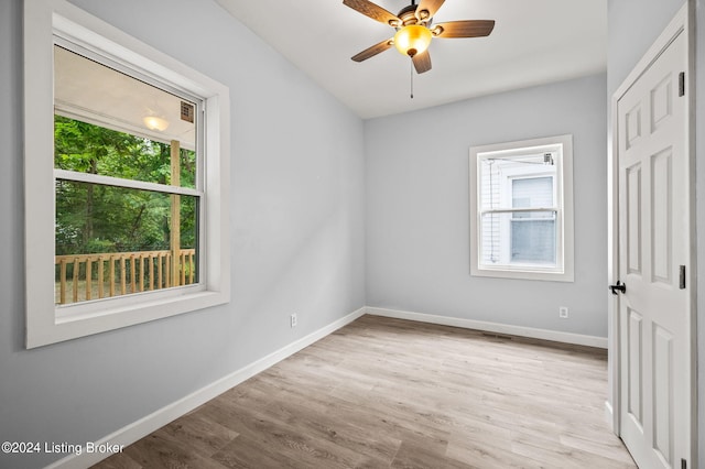 unfurnished bedroom featuring light wood-type flooring and ceiling fan