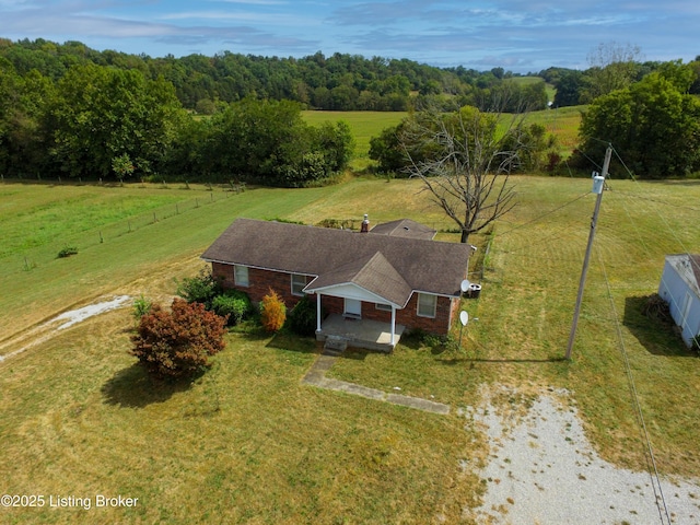 birds eye view of property featuring a rural view