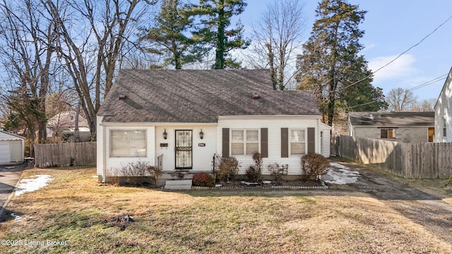 view of front of property with a front lawn