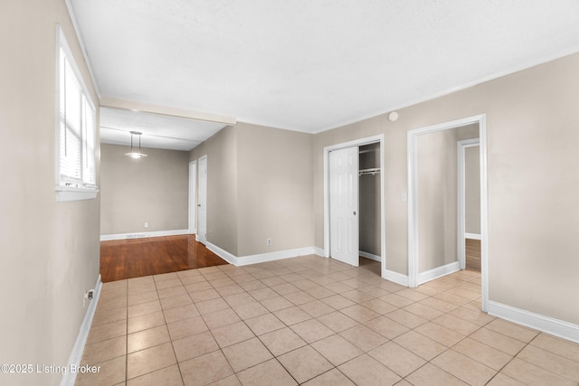 view of tiled spare room