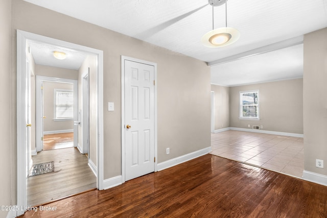 spare room featuring light hardwood / wood-style flooring