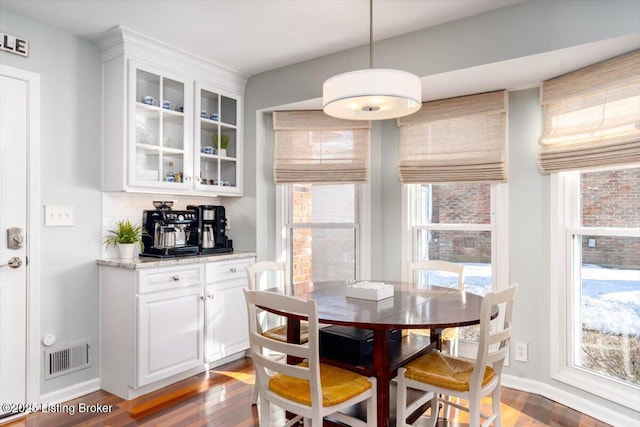 dining room featuring wood-type flooring