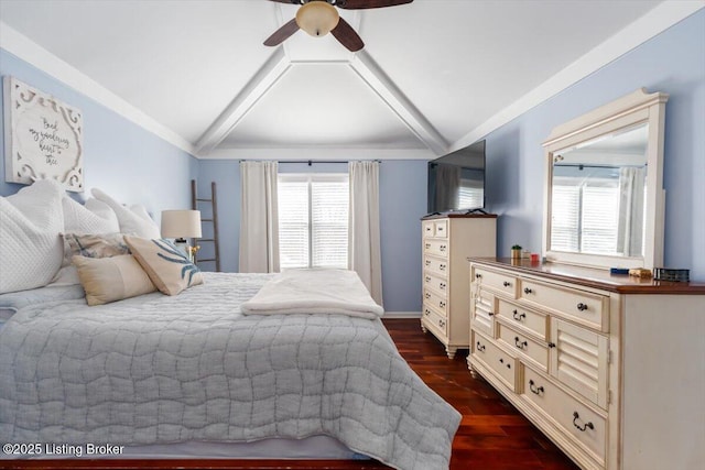 bedroom with lofted ceiling, ceiling fan, and dark wood-type flooring