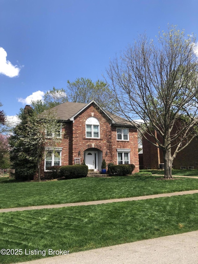 view of front of home with a front yard