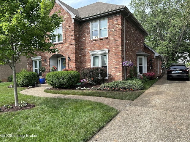 view of front of property with a front lawn