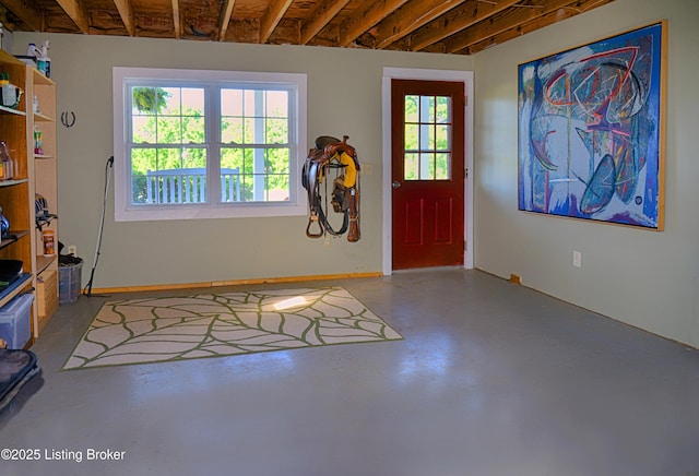 entrance foyer with concrete flooring