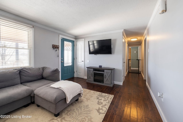 living room with dark wood-type flooring, a wealth of natural light, and ornamental molding