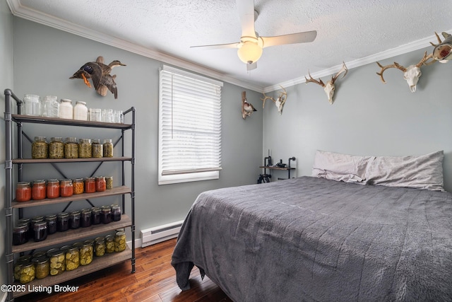 bedroom featuring ceiling fan, dark hardwood / wood-style flooring, multiple windows, and a baseboard radiator