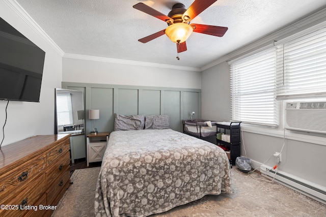 bedroom featuring a textured ceiling, ceiling fan, crown molding, and a baseboard radiator