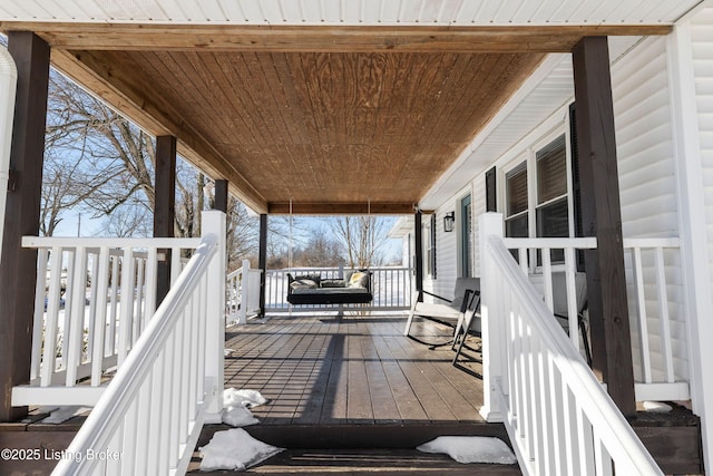 wooden deck with a porch