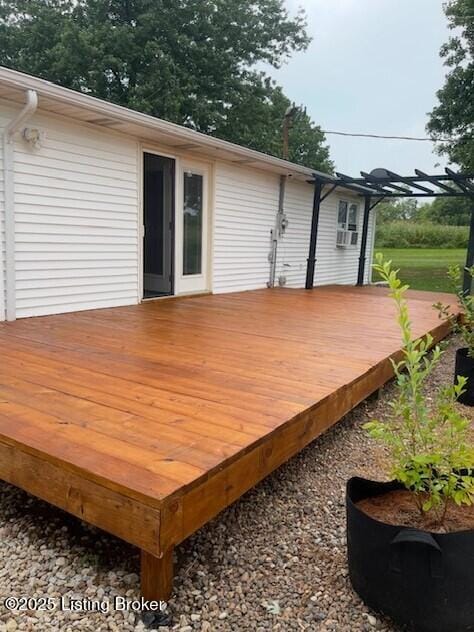 wooden deck with a pergola