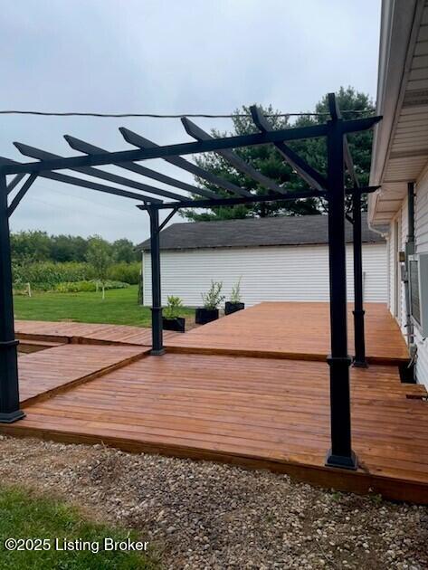 wooden deck with a pergola