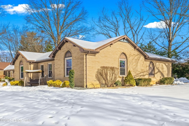 view of snow covered property