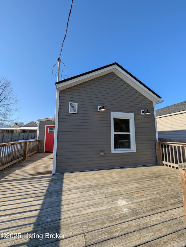 deck with a storage shed