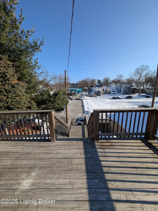 view of snow covered deck