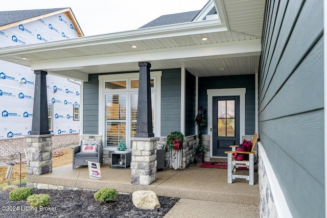 entrance to property with covered porch