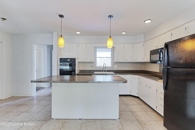 kitchen with pendant lighting, black appliances, a center island, white cabinetry, and sink