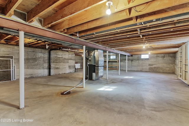 basement featuring heating unit