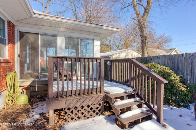 view of snow covered deck