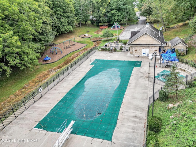 view of swimming pool featuring a patio area