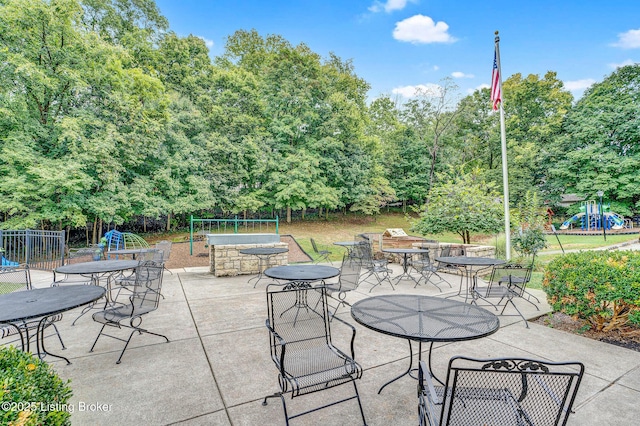 view of patio with a playground