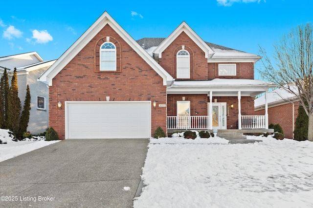 view of front of home featuring covered porch and a garage