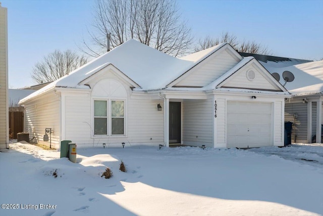 single story home featuring a garage