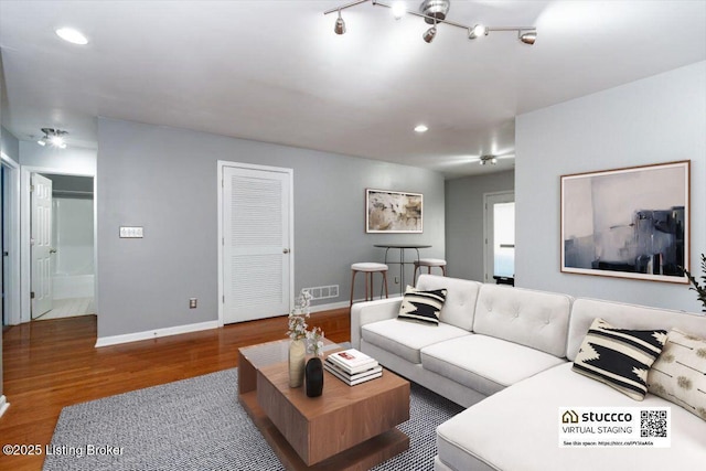 living room with hardwood / wood-style floors