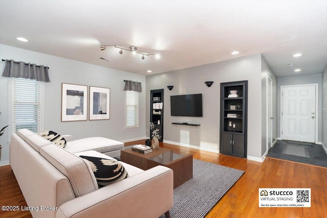 living room with hardwood / wood-style floors