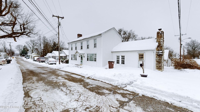 view of snow covered property