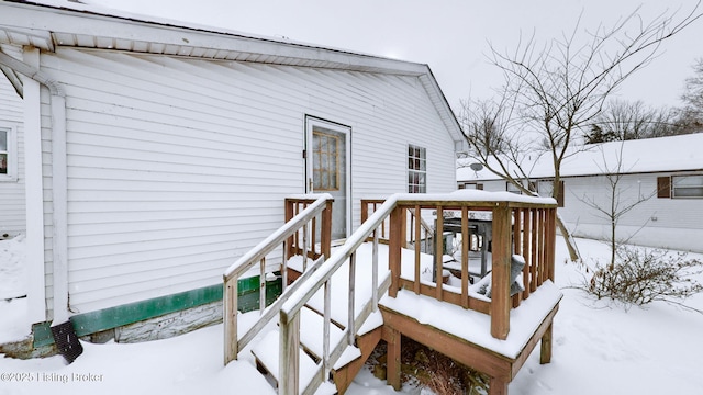 view of snow covered deck