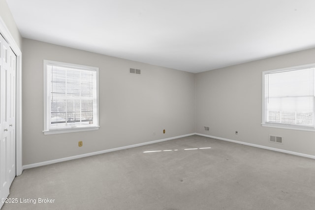 view of carpeted spare room