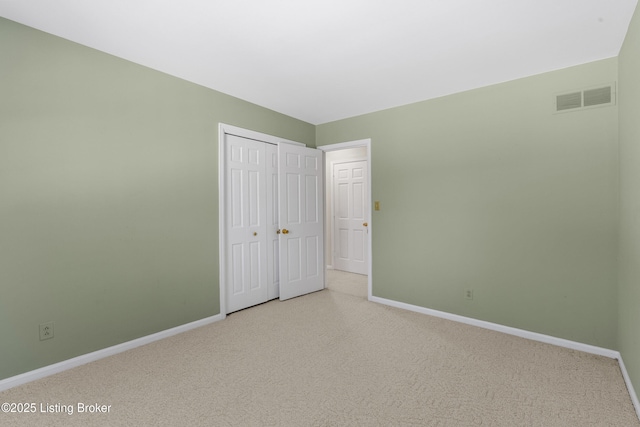 unfurnished bedroom with a closet