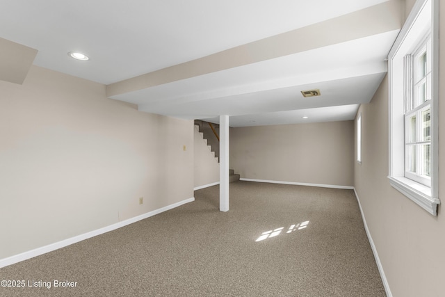 basement with carpet flooring