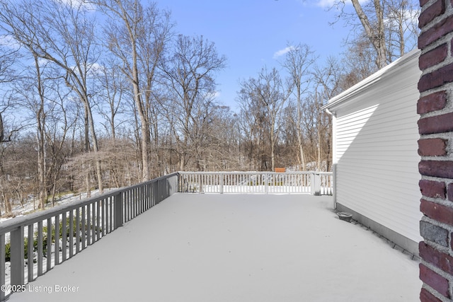 view of snow covered deck