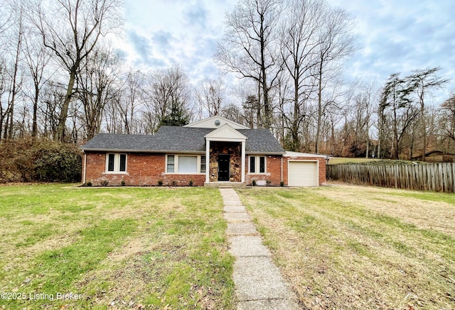 single story home featuring a front lawn and a garage