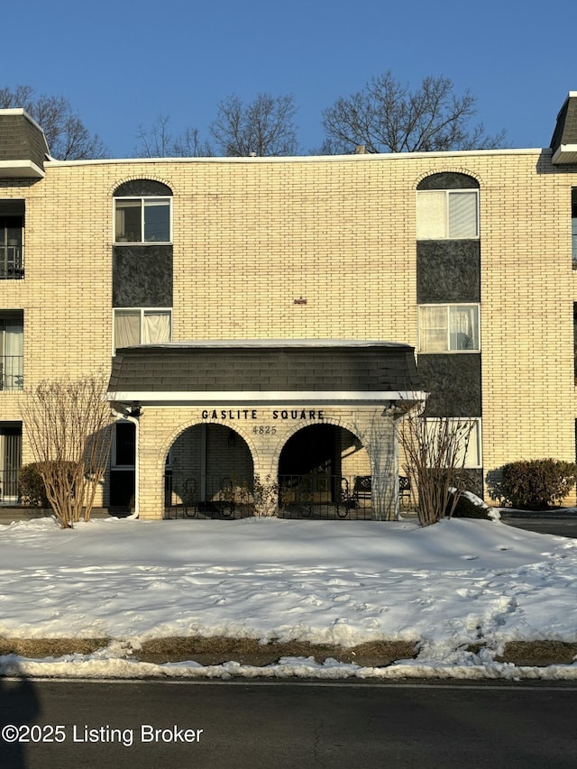 view of snow covered property