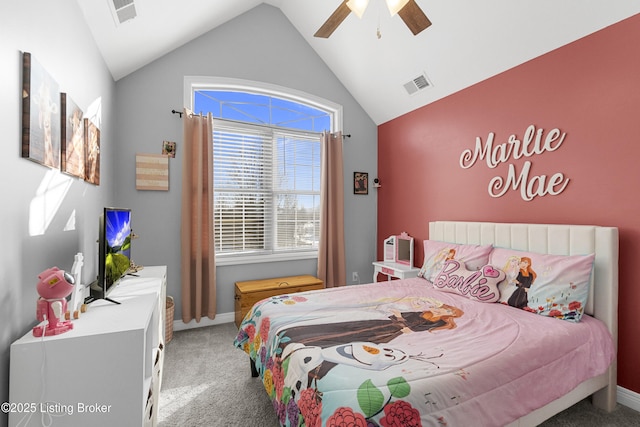 bedroom with ceiling fan, vaulted ceiling, and carpet flooring