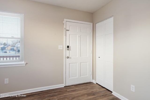 interior space featuring dark wood-type flooring