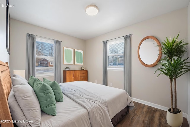 bedroom featuring dark wood-type flooring