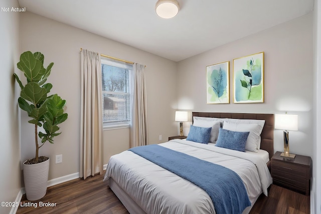 bedroom featuring dark hardwood / wood-style floors