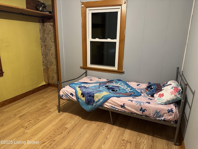 bedroom with light hardwood / wood-style flooring