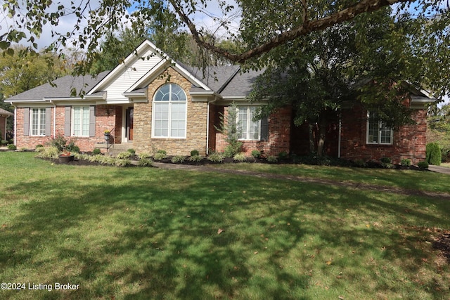 view of front of house with a front lawn