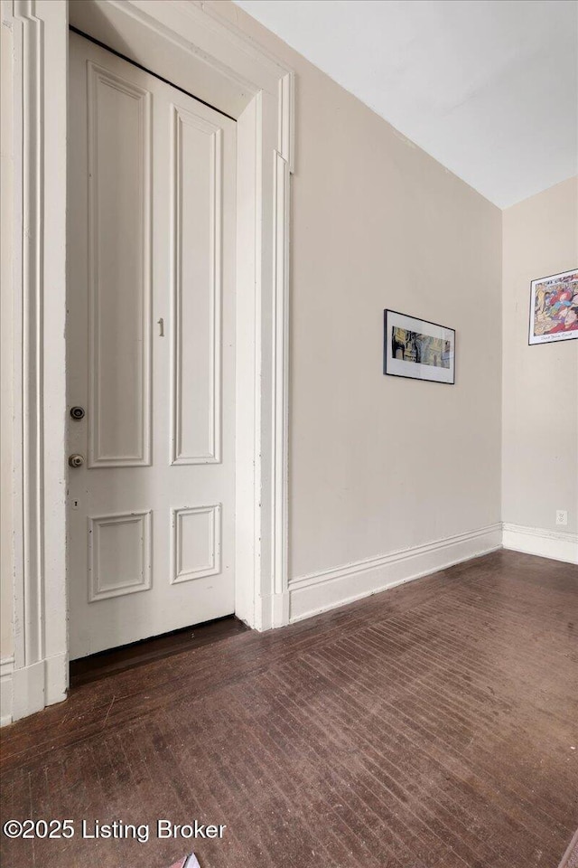 interior space with dark wood-type flooring