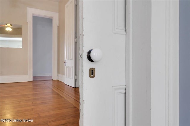 interior details featuring wood-type flooring