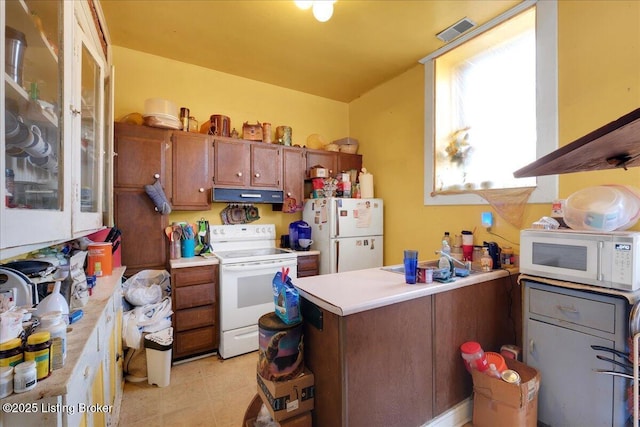 kitchen featuring white appliances