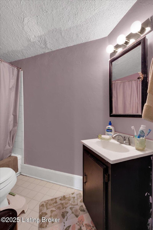 full bathroom featuring shower / bathtub combination with curtain, tile patterned flooring, vanity, a textured ceiling, and toilet