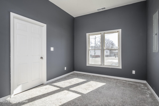 unfurnished room featuring light colored carpet