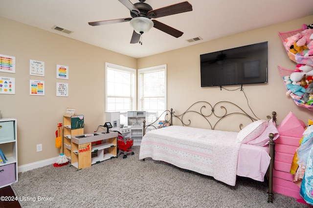 bedroom with ceiling fan and carpet floors